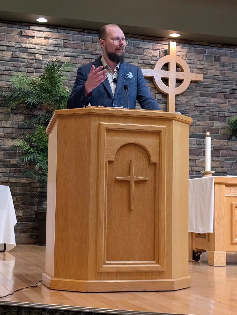 Jeremy Gardiner preaching from a pulpit